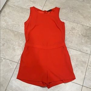 Orange romper with pockets
